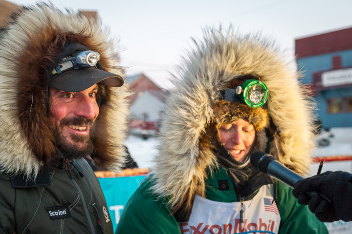 Paige and Cody at the finish line in Nome after Paige's first Iditarod finish in 2013